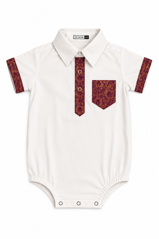An off-white baby short-sleeve bodysuit styled like a polo shirt, featuring a patterned red and gold tie detail on the chest, a matching patterned chest pocket, and patterned sleeve cuffs.